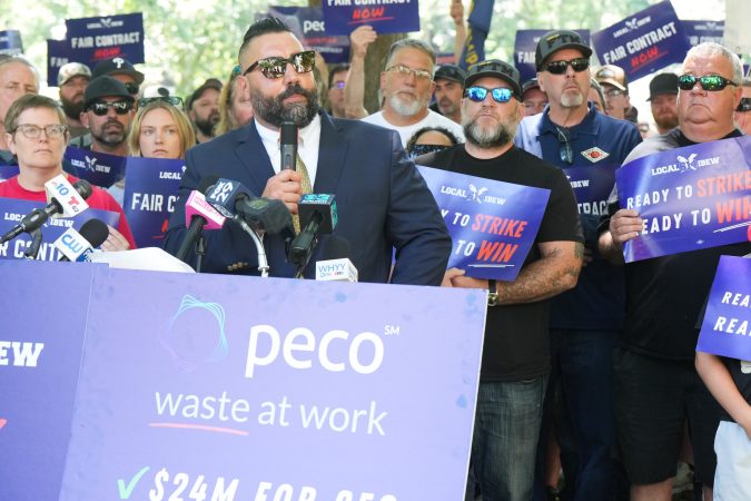 Larry Anastasi, IBEW Local 614 president, speaks to workers and union representatives who gathered in Washington Square Park on Thursday as the union announced a strike plan.
