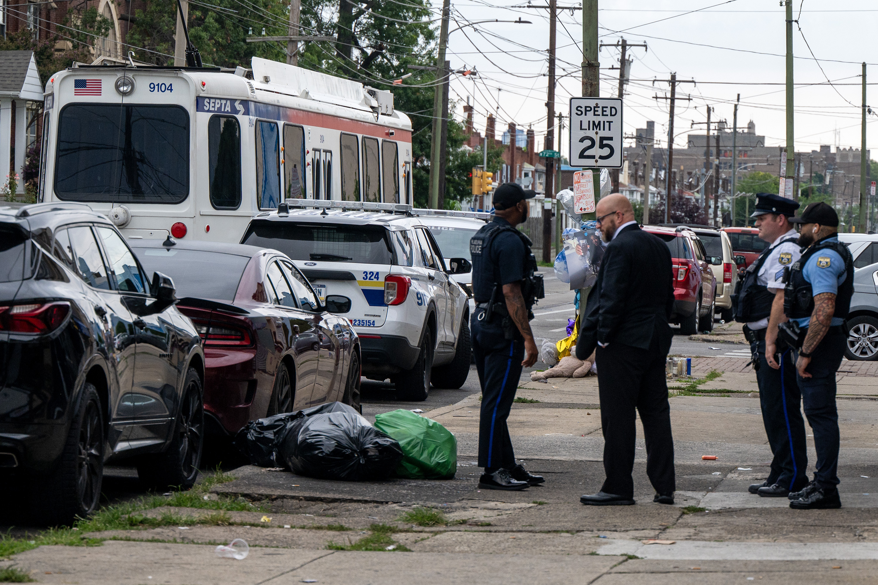 Police release images of a suspect in the killing of an off-duty Philly officer