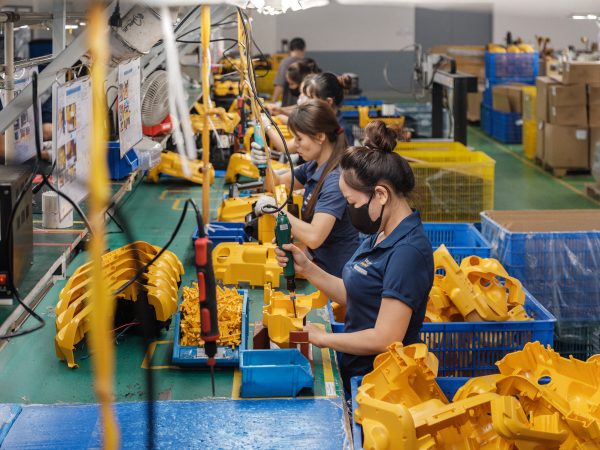 Workers assemble vacuum cleaners at a Techcom Industry factory on the outskirts of Hanoi, Vietnam, on May 29.