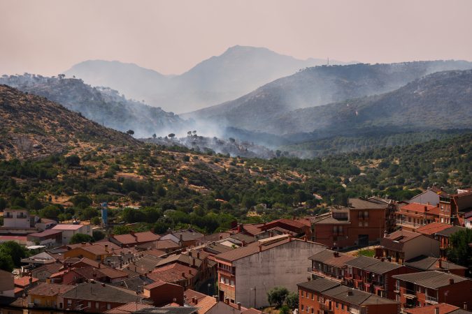 France and Spain battle wildfires as more than 250,000 people are forced to flee homes