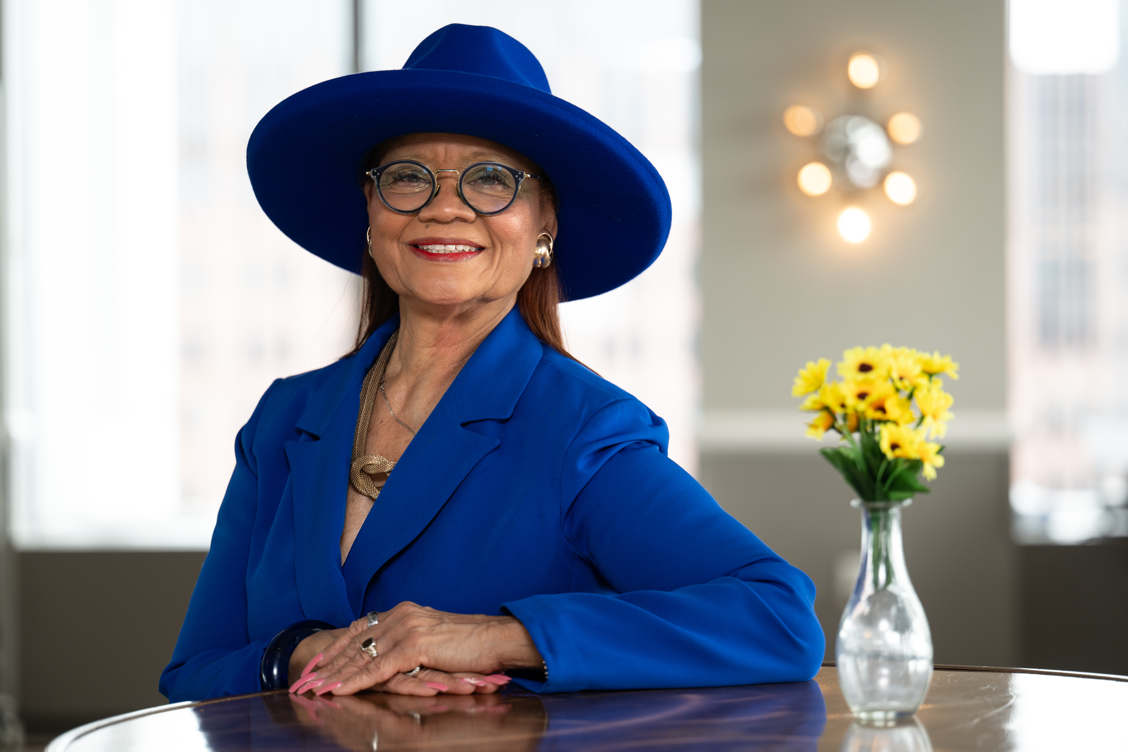 Lorina Marshall-Blake wears retirement with the verve and flair of one of her signature hats