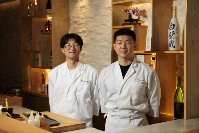 Head chefs Leo Liu, left, and Ming Lee, right, posed for a portrait at Oroshi on Thursday, July 16, 2026 in Philadelphia. Oroshi offers a $68 omakase.
