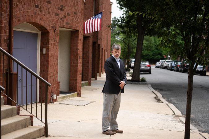 Brent Rose stands at the bus stop where his nine-year-old son, who has autism, waits for the bus to travel to Philadelphia's Extended School Year program for kids with special needs, in Philadelphia, July 10, 2026. The problem is that his bus often never shows up to take him there.