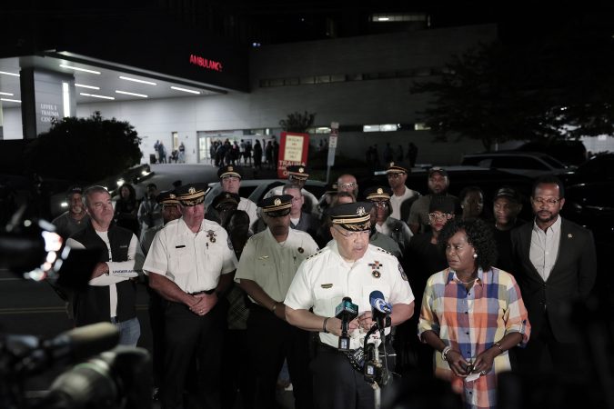 Three Philadelphia police officers were wounded in a shooting late Saturday. The gunman was a retired firefighter.