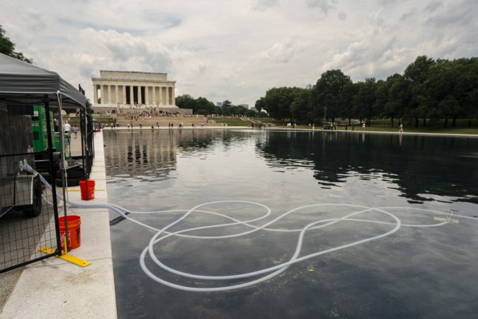 Before Reflecting Pool, algae contractor had troubled project on a trash-infested river