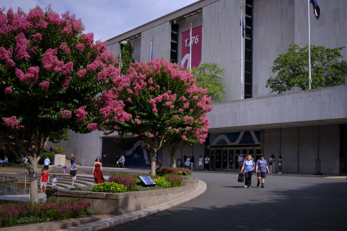 Trump orders warning signs near Smithsonian, escalating fight over history