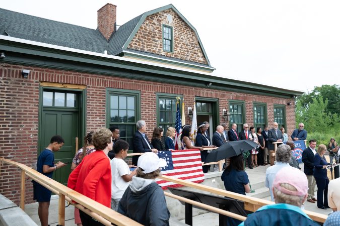 Organizers, local politicians, and community members gather at the soft opening of the American Revolution Museum of Southern New Jersey in Camden on Saturday.