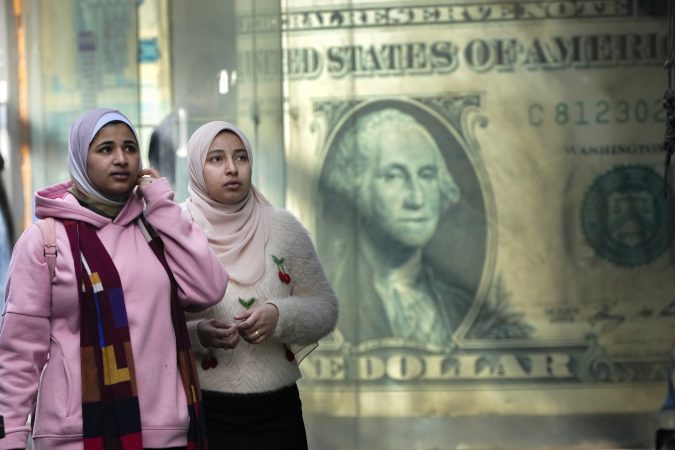 Dollar hits 13-month high as foreign investors overlook worries about Trump