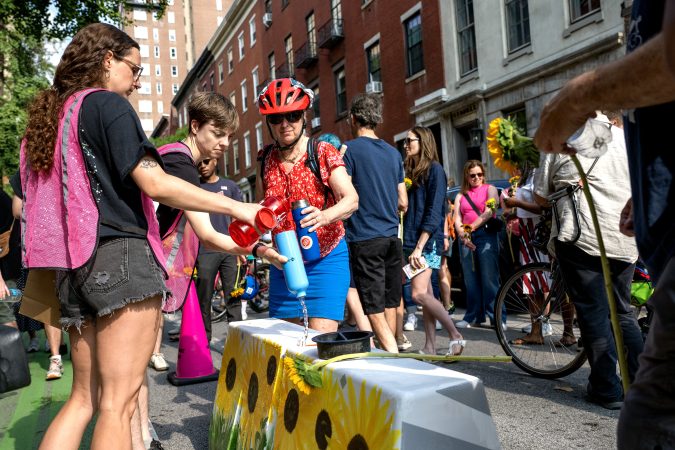 Memorial honoring woman killed by drunk driver moved hours after its installation on Spruce Street
