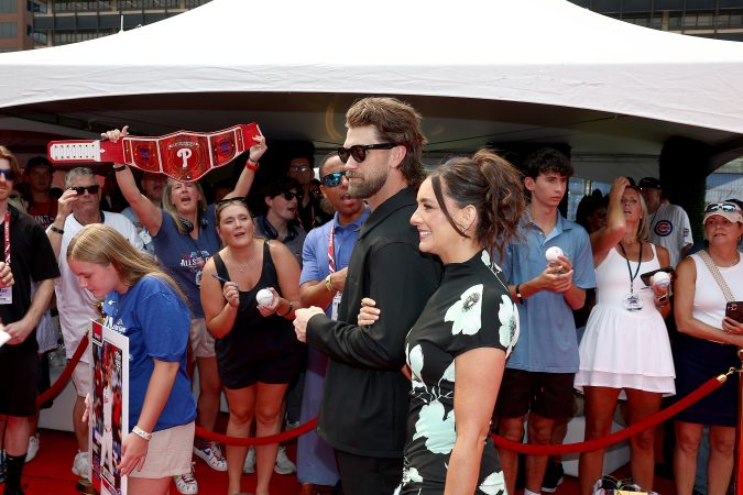 Bryce Harper is a baseball superstar. But he says his wife, Kayla, has ‘one of the hardest jobs in the world.’