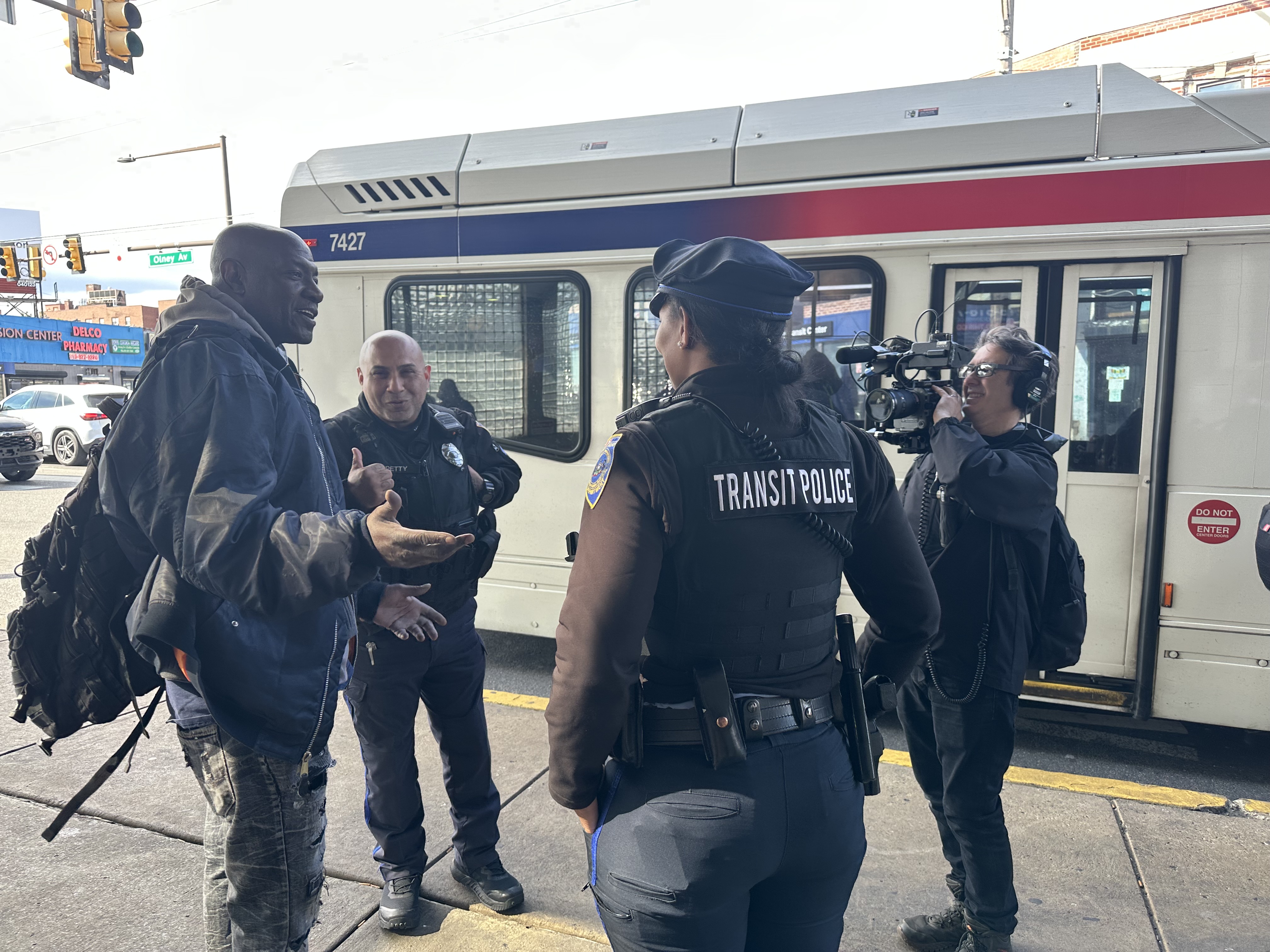 A camera operator from Double Act Productions films Transit Police officers on the job at the Olney Transportation Center. The company is making a TV docuseries for the A&E cable network.