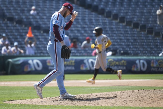 Phillies pitcher Kyle Backhus reacts after allowing a solo home run to the Pirates' Nick Gonzales in the ninth inning on Thursday.