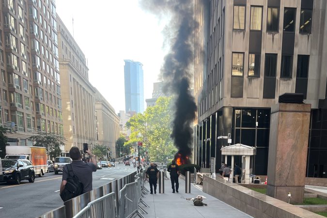 Ex-soldier started a fire and fired a pellet gun outside a New York federal building, FBI says