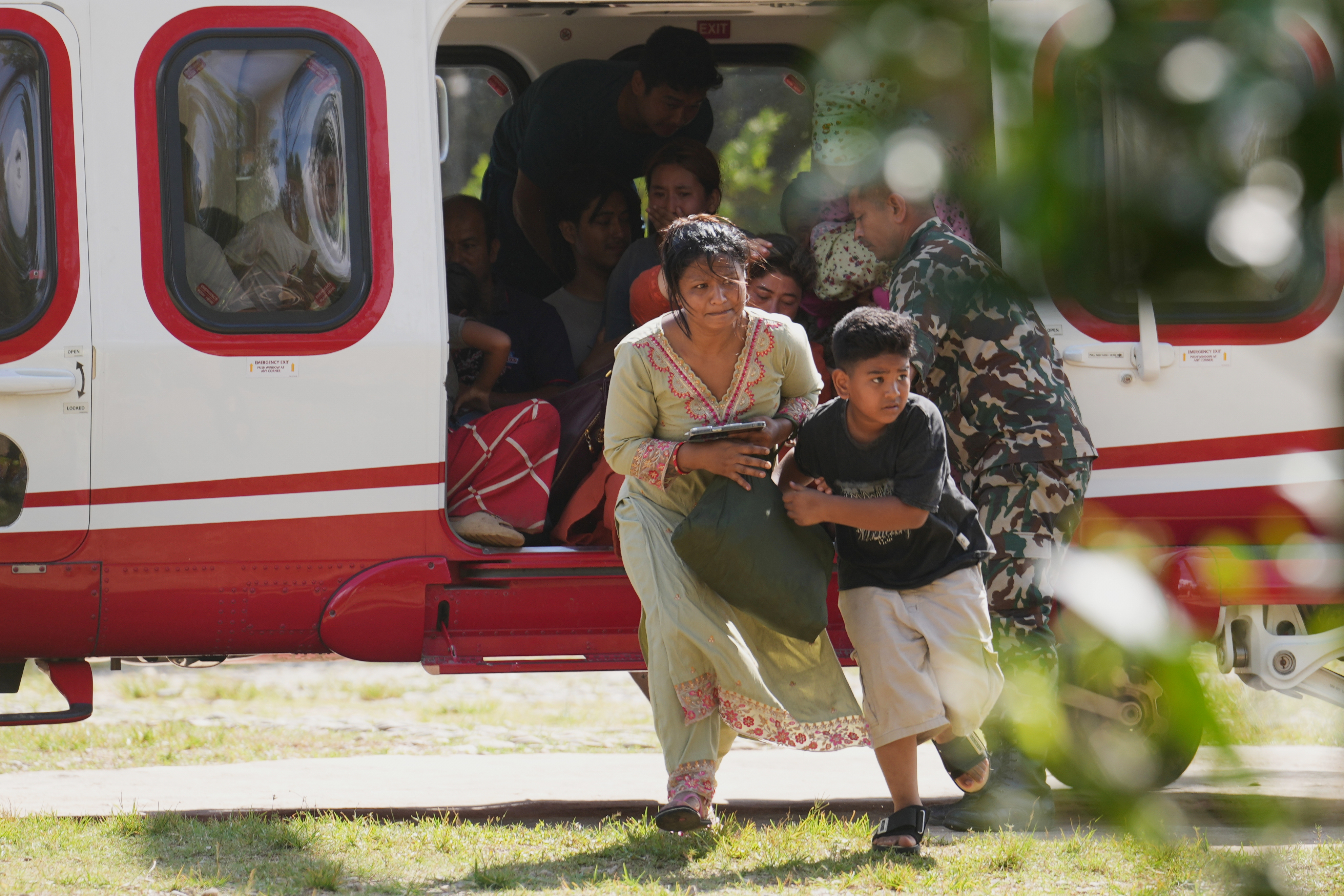 Death toll rises in Nepal-China border disaster as a lake poses new flood threat