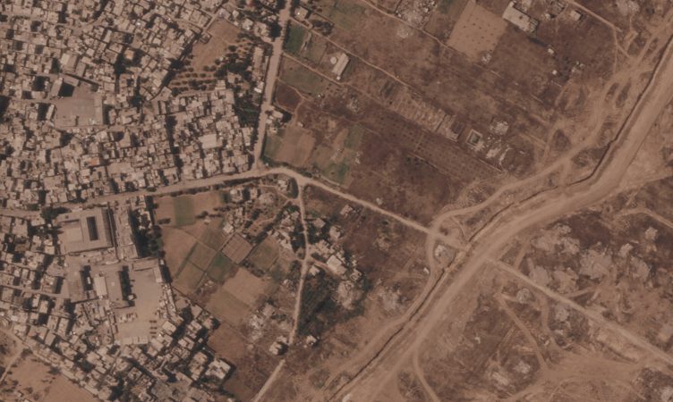 Israel is building a miles-long earthen barrier inside Gaza, entrenching its division