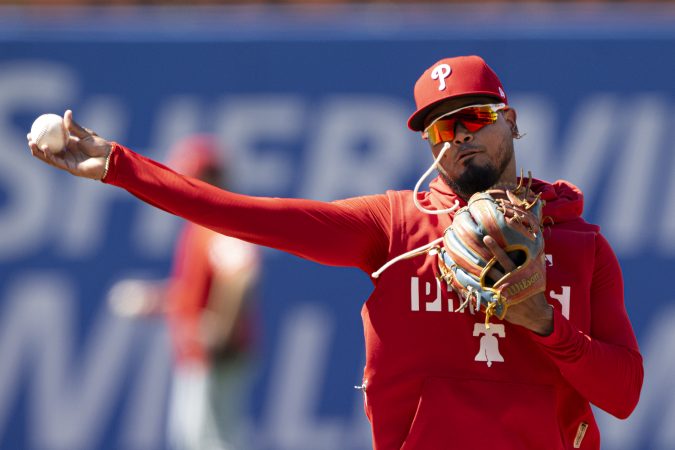 New Phillies second baseman Luis Arraez warms up before his debut on Tuesday against the Nationals.
