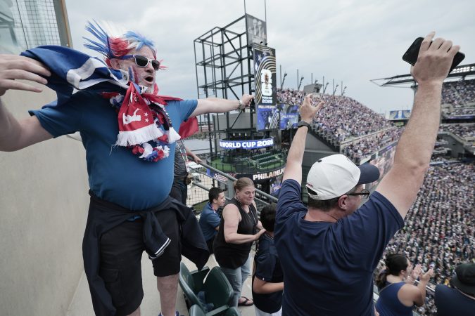 Prior to the rain arriving, France took a 1-0 lead over Iraq, causing Jimmy Coilliot of Lille, France, to dance in celebration.