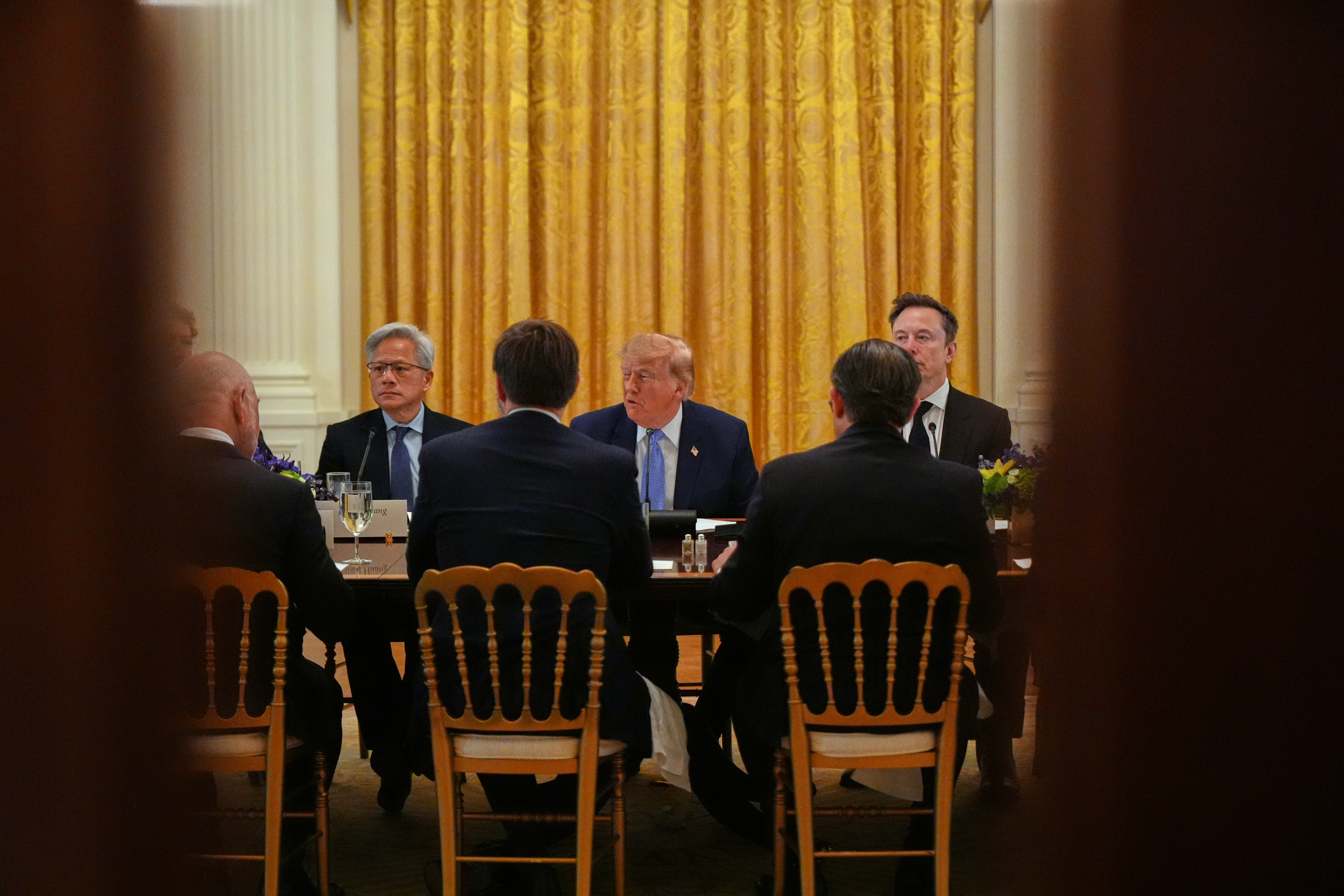 Trump launches government chatbot, urging a wary public not to fear AI