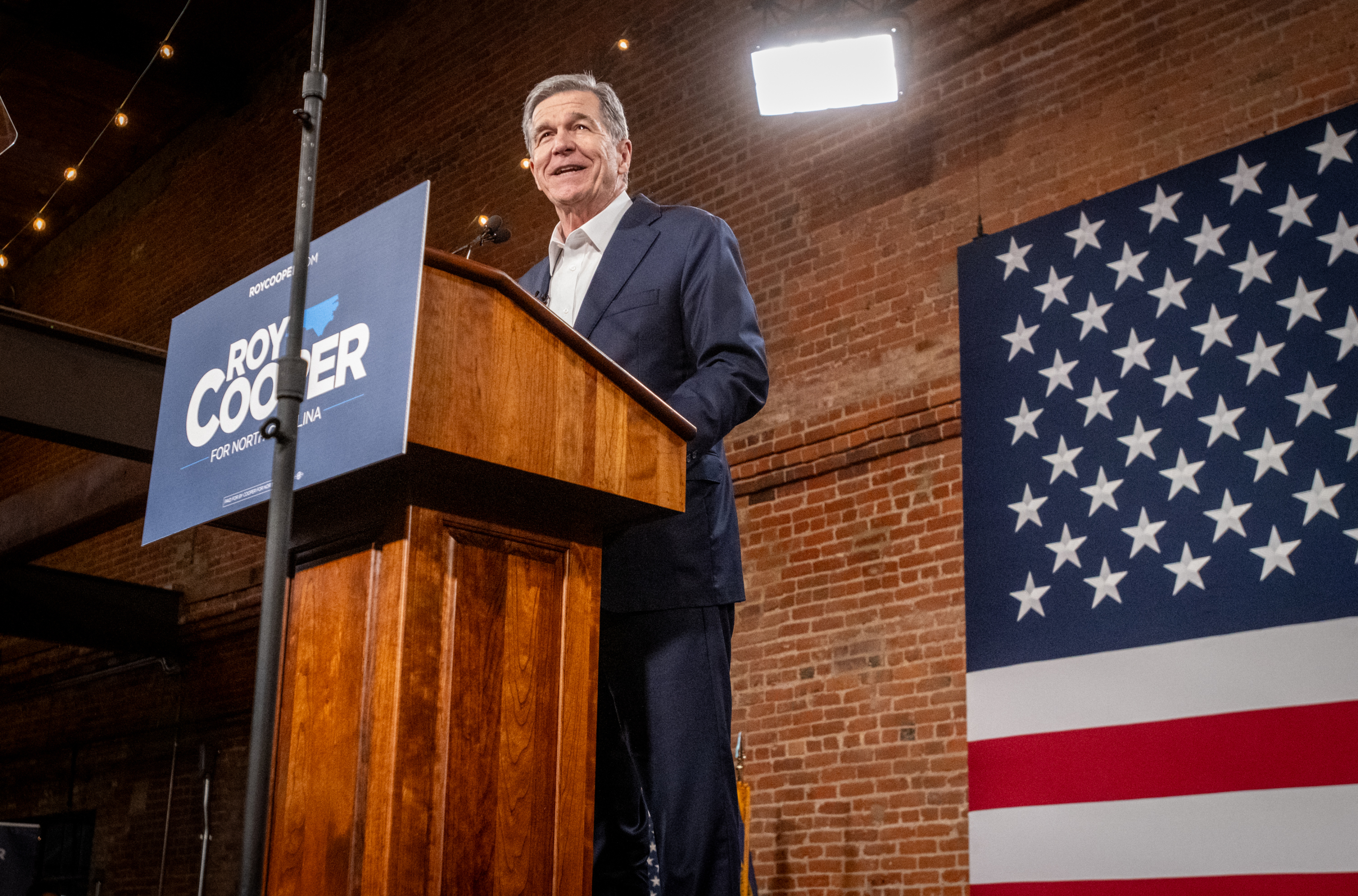 Roy Cooper, the former Democratic governor now running for a U.S. Senate seat, speaks at a rally in Durham, N.C., on April 9. Across the country, and especially in the North Carolina Senate race, Republicans have charged opponents with being soft on crime, even as President Trump brags over plunging crime rates.