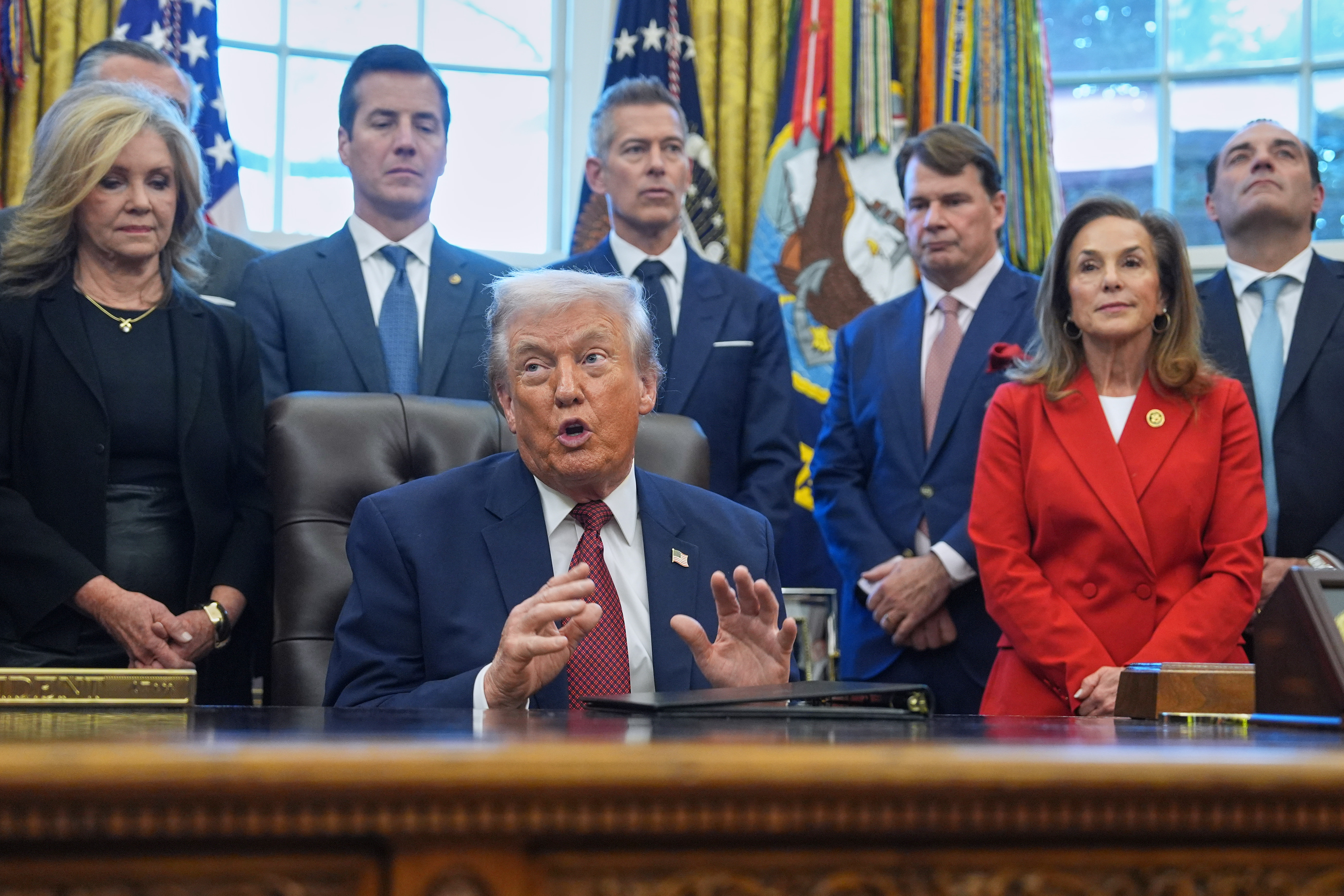 Trump administration lowers fuel economy standards, critics say at a significant environmental cost