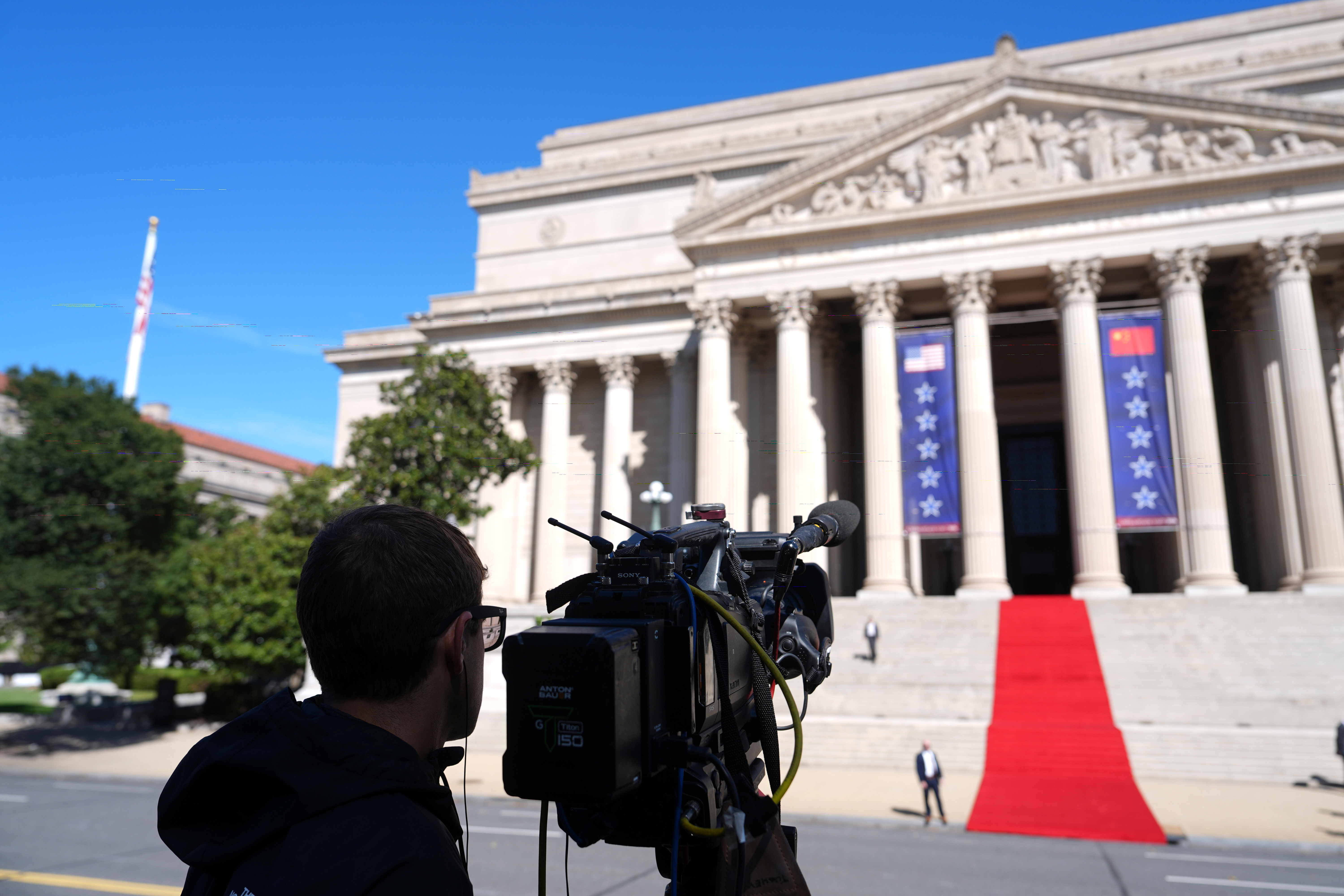 White House network TV pool resumes operations after a dayslong ban of news outlets from grounds