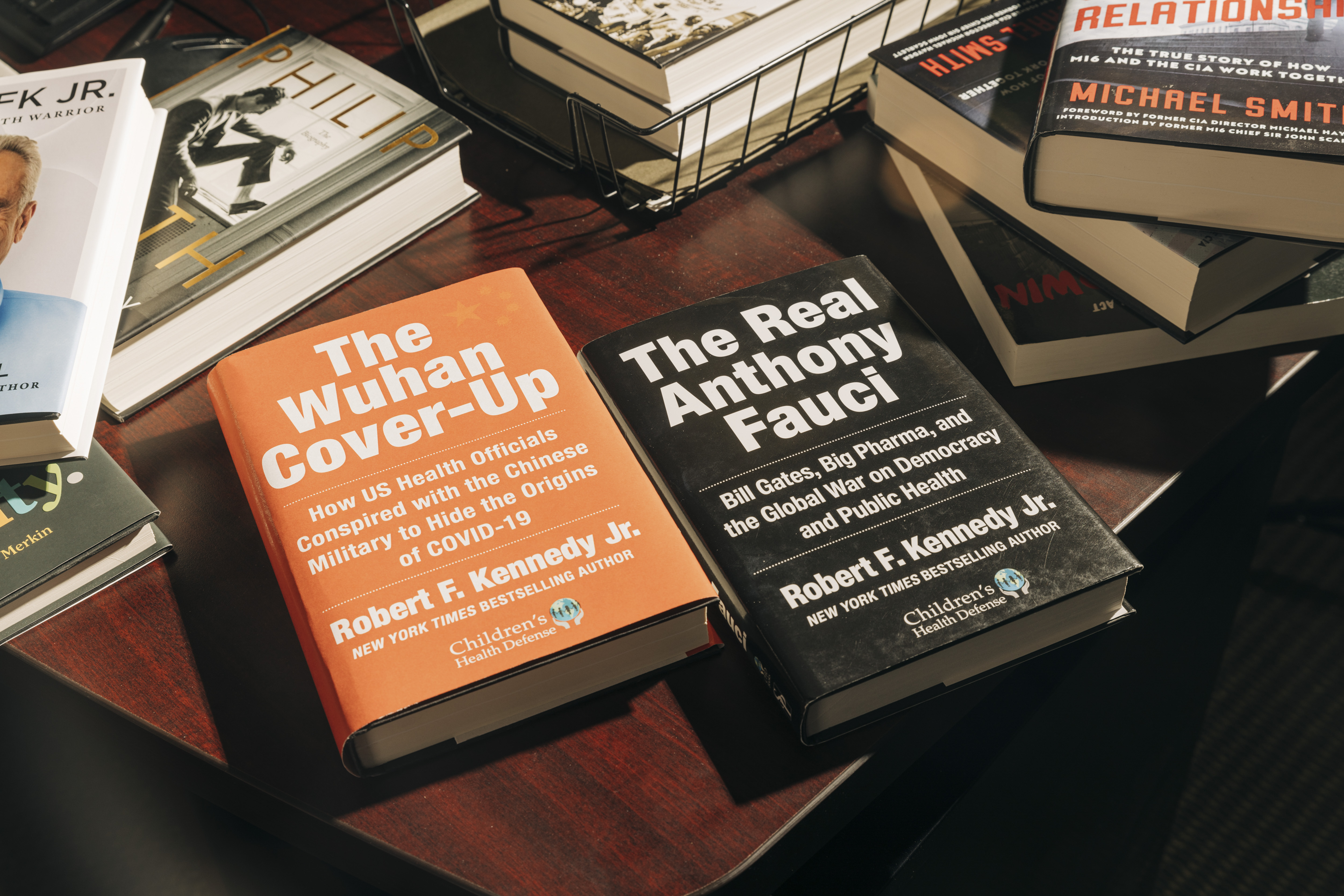 Books written by Robert F. Kennedy Jr. at Tony Lyons' office at Skyhorse Publishing in Manhattan, Aug. 10, 2023. Kennedy has written numerous books for Skyhorse Publishing, and worked as a consultant to the company before he became health secretary.