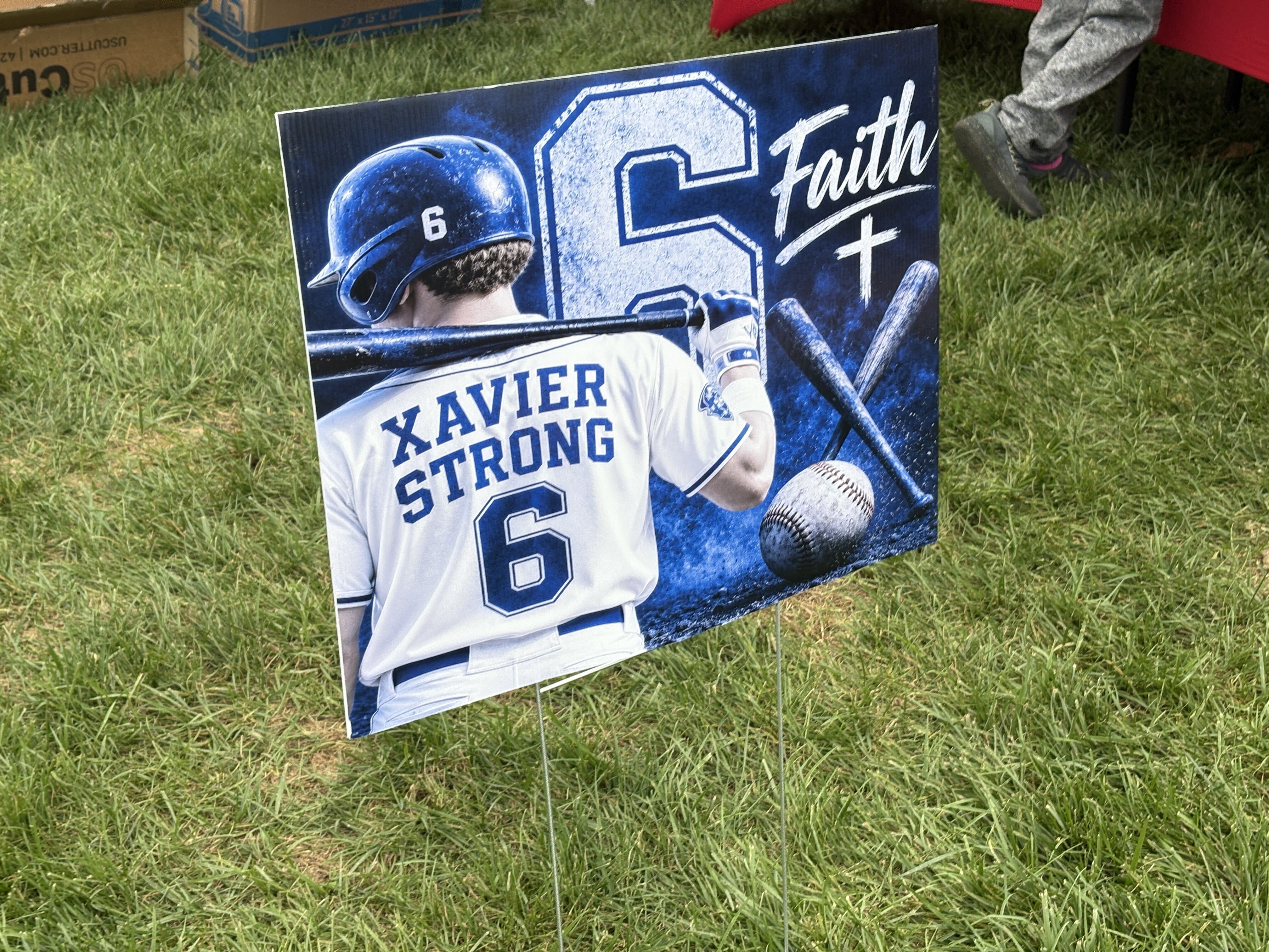 Supporters gather at a prayer service for 12-year-old Xavier Taylor, a Maple Shade baseball player who was hit in the head by a ball over the summer.