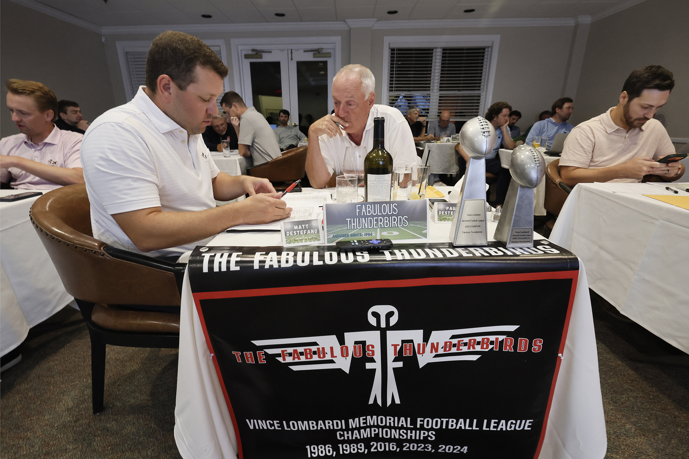 Matt and Paul DeStefano during the 41st annual Vince Lombardi Memorial Football League fantasy draft on Aug. 28 at the Chester Valley Golf Club in Malvern.