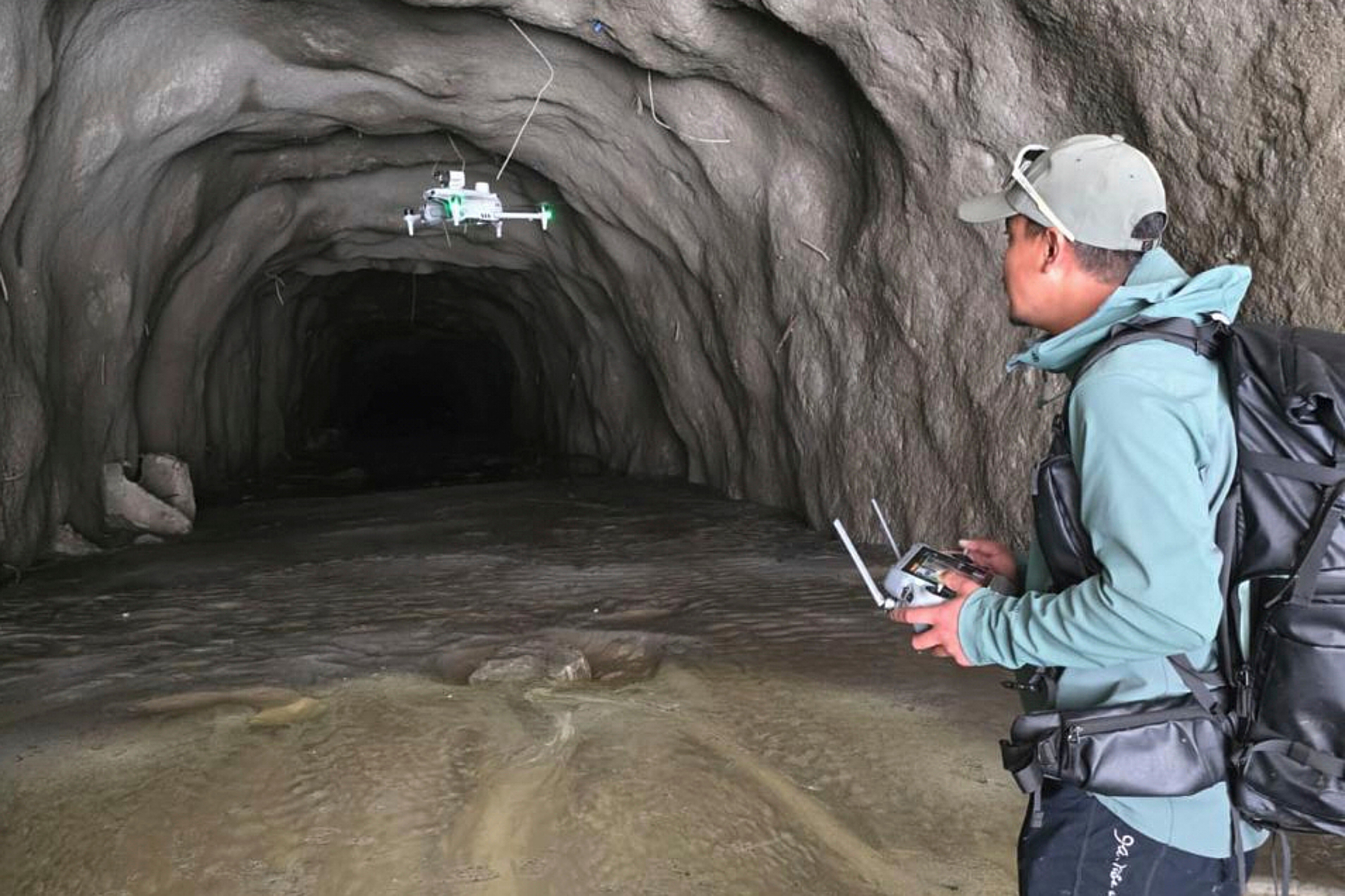 Drones helped find people after Nepal floods but the search inside hydropower tunnels is a challenge