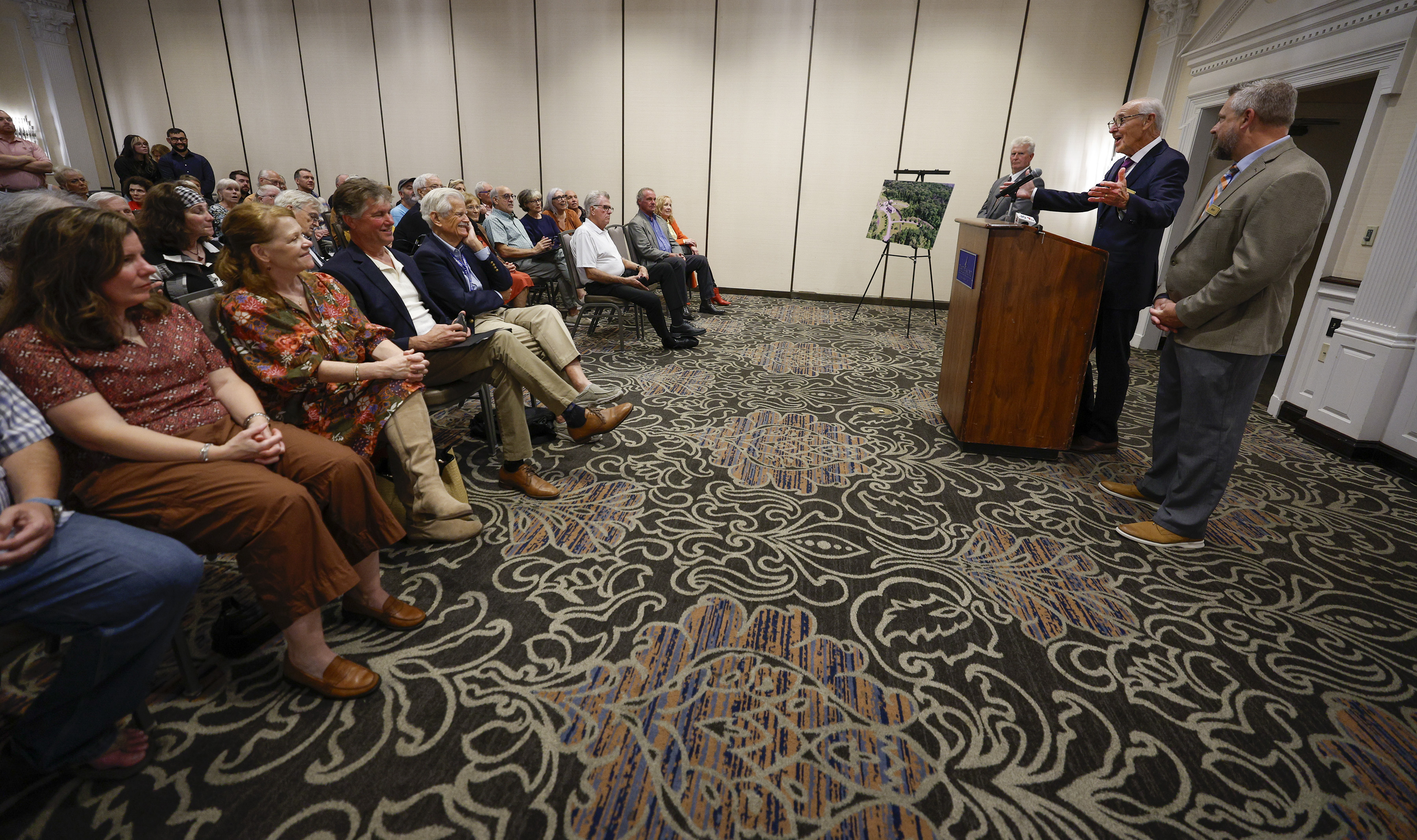 The auction for St. Peter’s Village was postponed as a full house waited to see the new owners