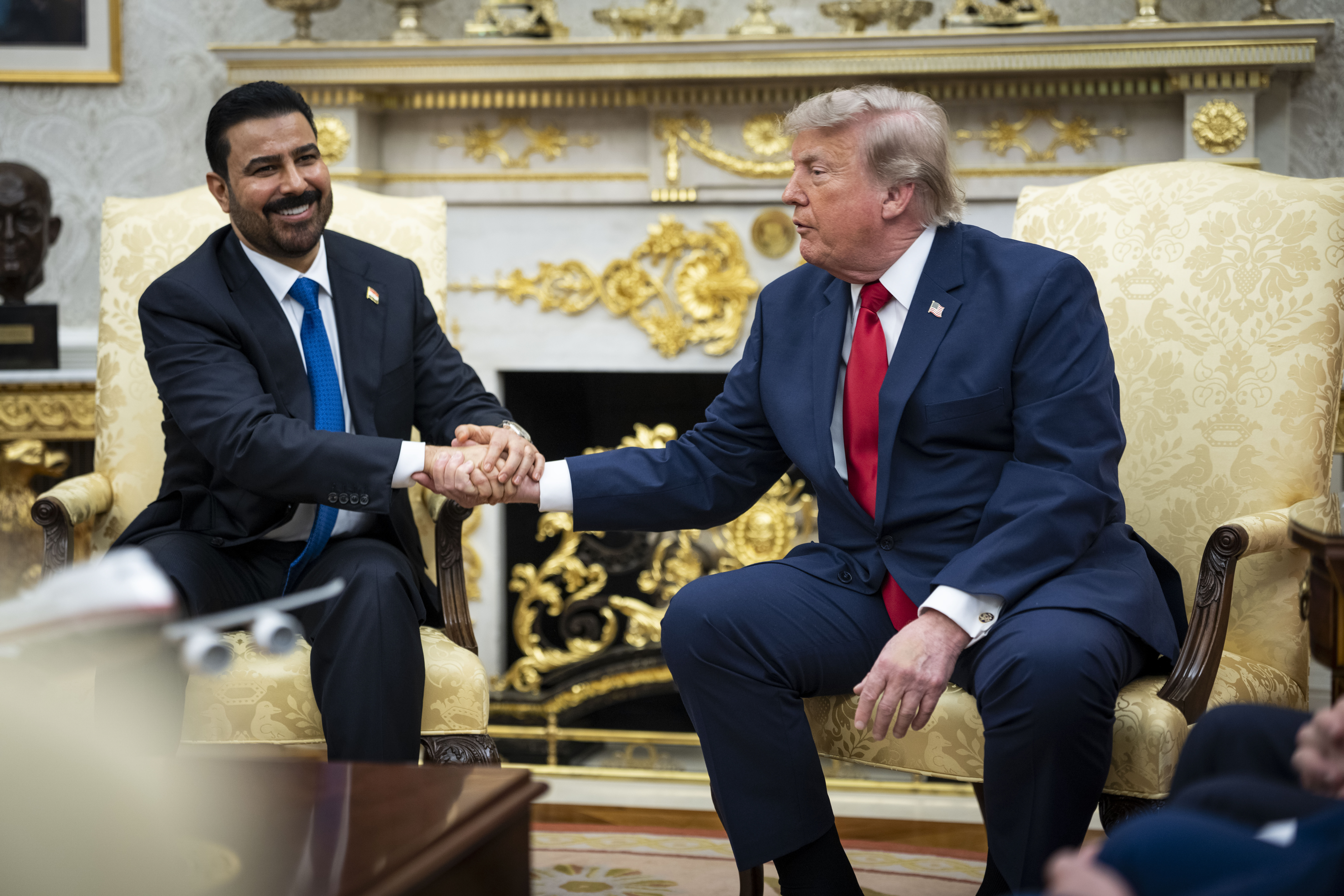 Prime Minister Ali al-Zaidi of Iraq meets with President Donald Trump in the Oval Office of the White House in Washington on July 14. Some Iraqis are celebrating the end of an American military presence that unleashed waves of bloodshed. Others fear what happens next for their country, trapped between Washington and Tehran.
