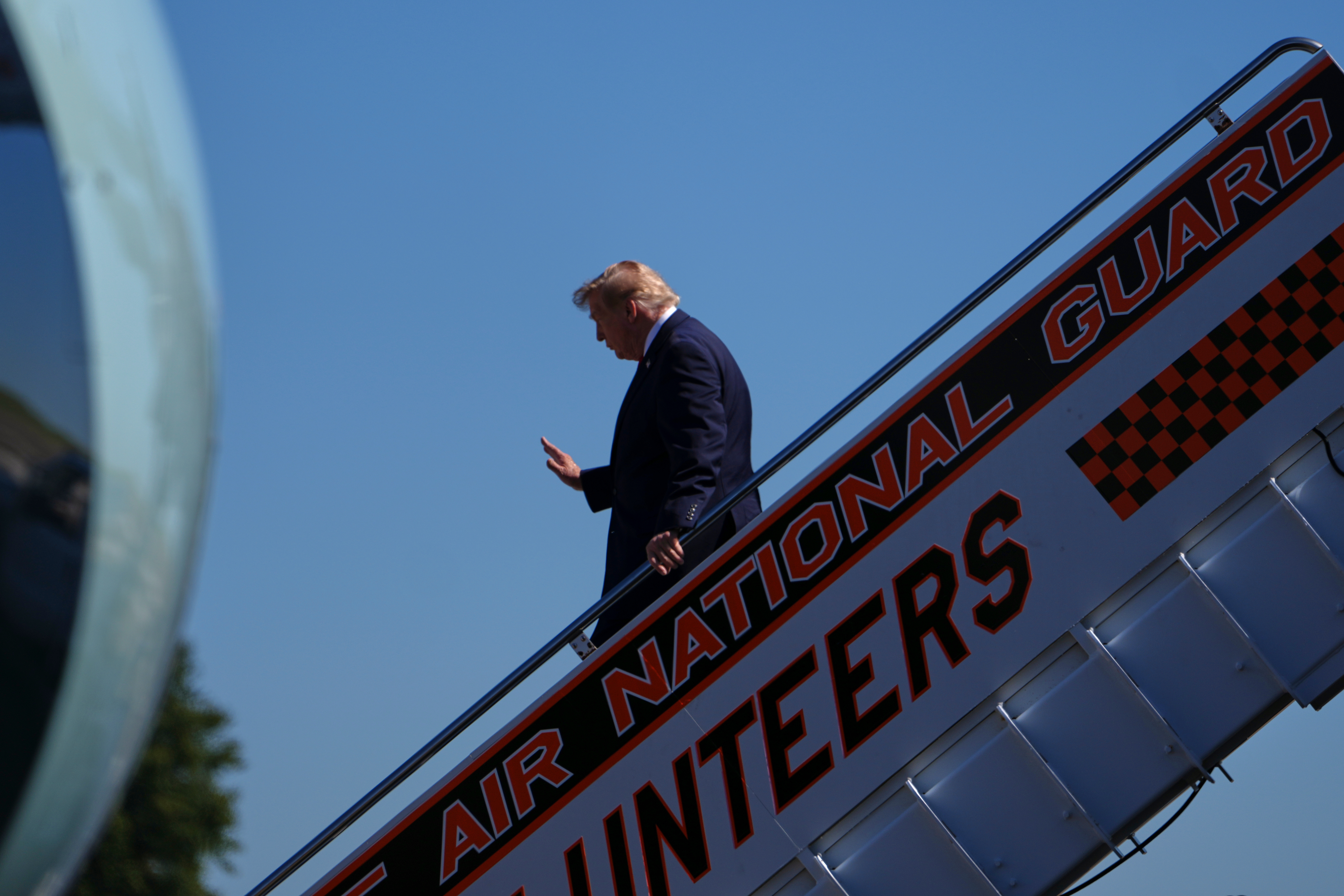 CNN says it was left off Air Force One for Trump’s Saturday trip to a college football game