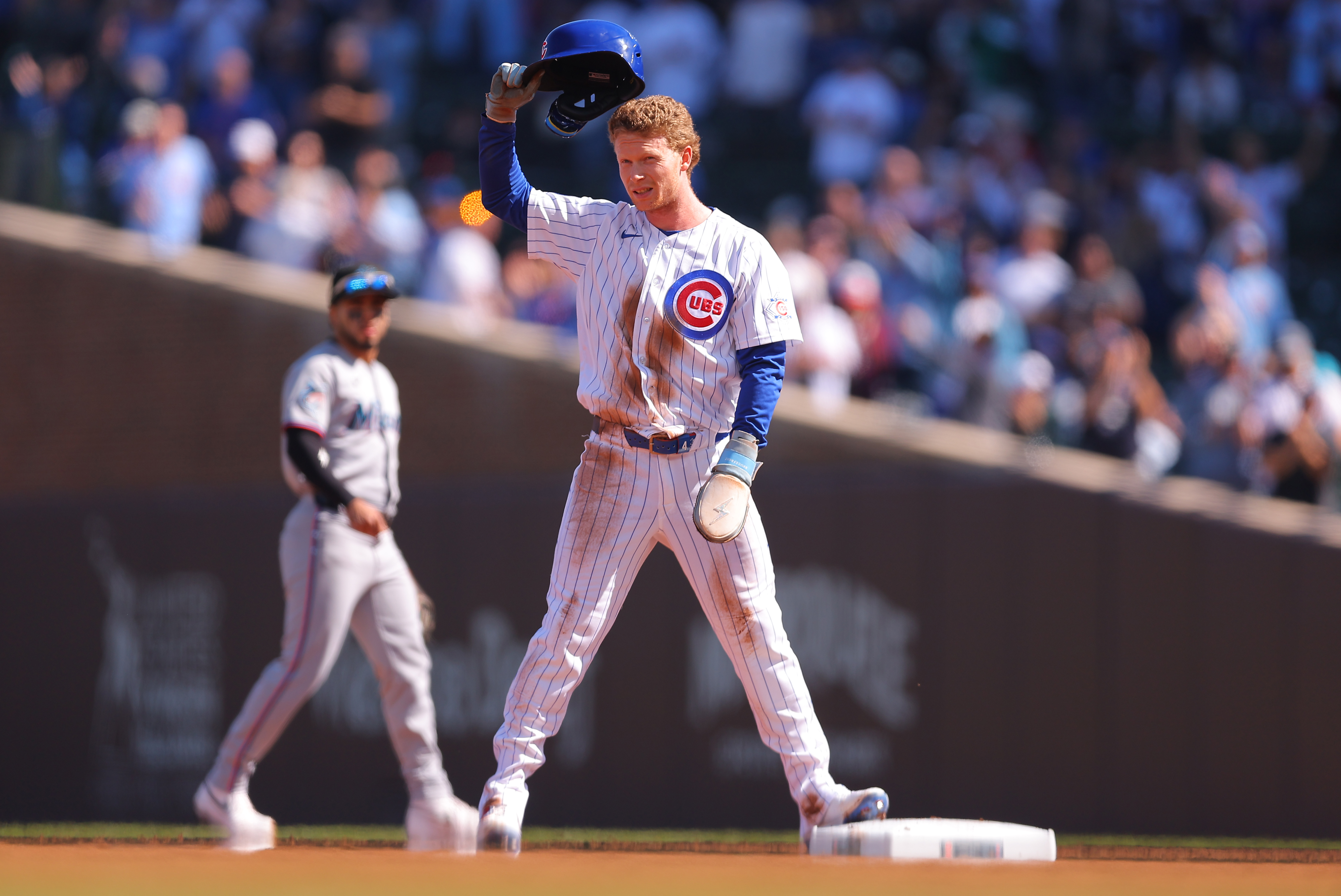Cubs clinch second straight playoffs trip by beating Marlins as Crow-Armstrong joins 40-40 club