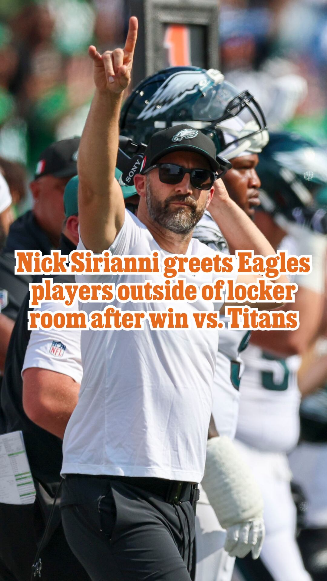 Nick Sirianni greets Eagles players outside of locker room after win vs. Titans
